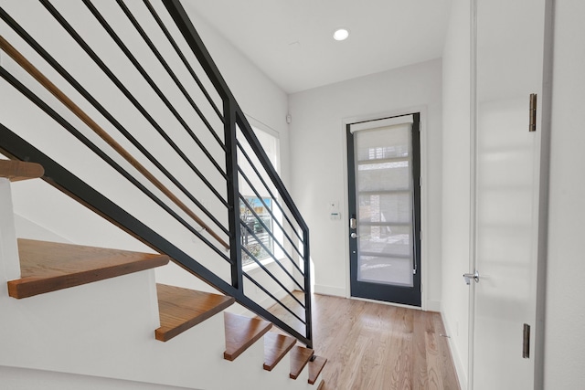 entryway with light hardwood / wood-style flooring