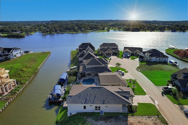 drone / aerial view with a water view