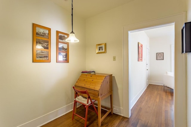 hallway featuring hardwood / wood-style flooring