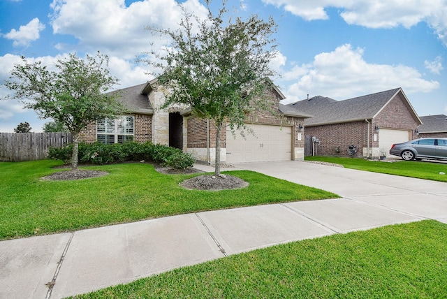 view of front of house with a garage and a front yard