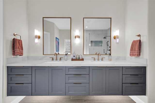 bathroom with vanity and walk in shower