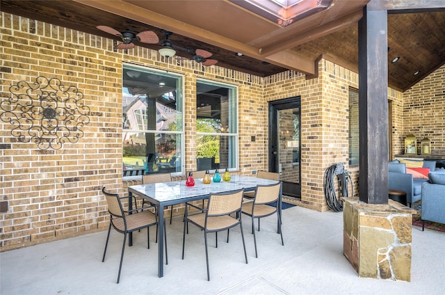 view of patio featuring ceiling fan