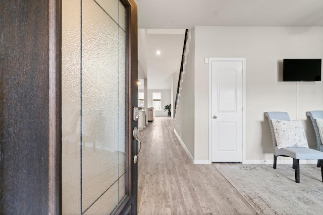 hallway featuring light wood-type flooring