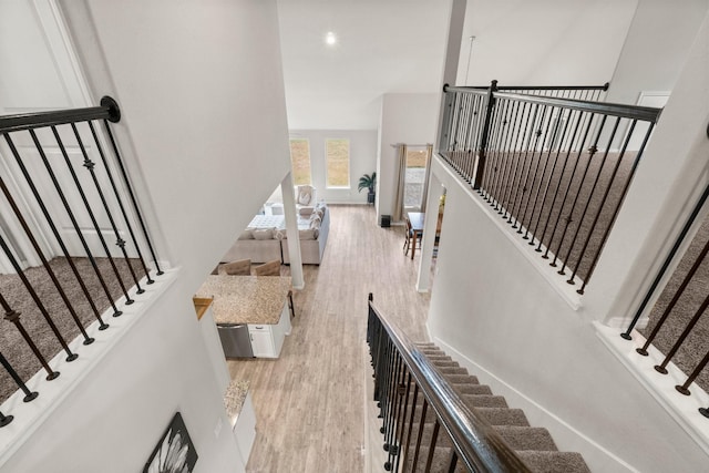 stairway with wood-type flooring