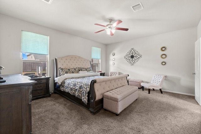 bedroom with ceiling fan and carpet flooring