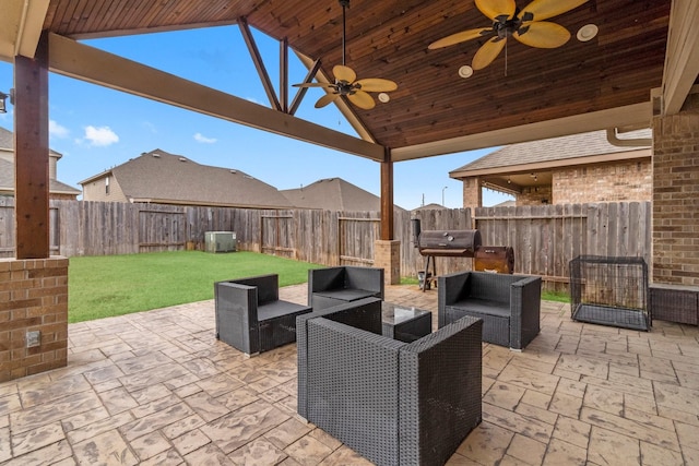 view of patio with an outdoor living space, grilling area, and ceiling fan