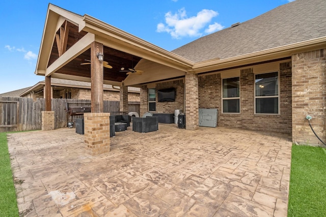 view of patio featuring ceiling fan