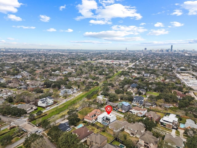 drone / aerial view with a view of city and a residential view