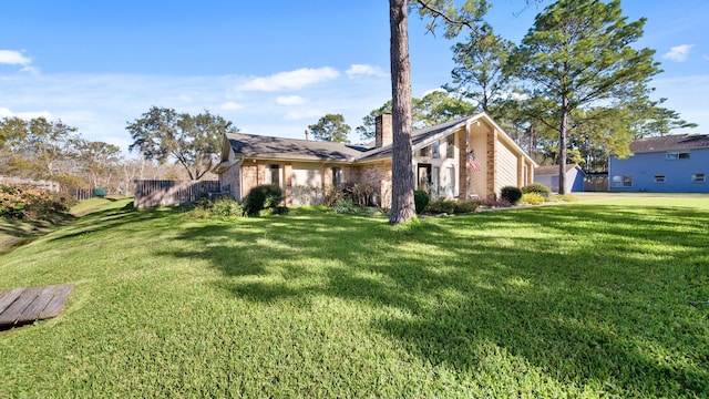 exterior space featuring a lawn