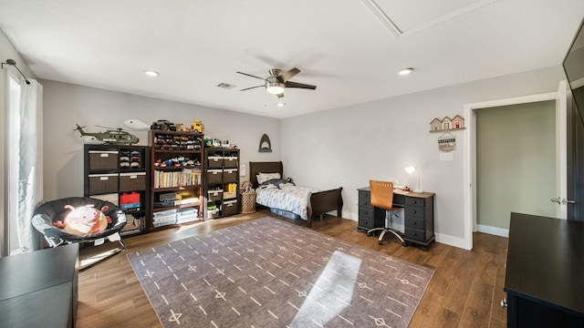 bedroom featuring dark hardwood / wood-style floors and ceiling fan