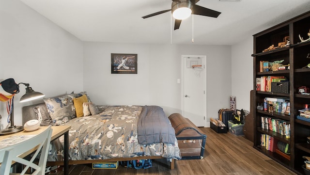 bedroom featuring wood-type flooring and ceiling fan