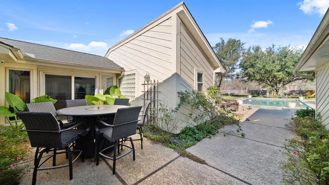 view of patio featuring a fenced in pool