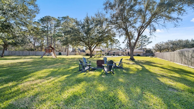 view of yard with a playground