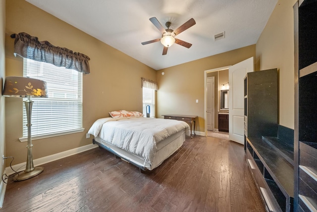 bedroom featuring dark hardwood / wood-style floors and ceiling fan