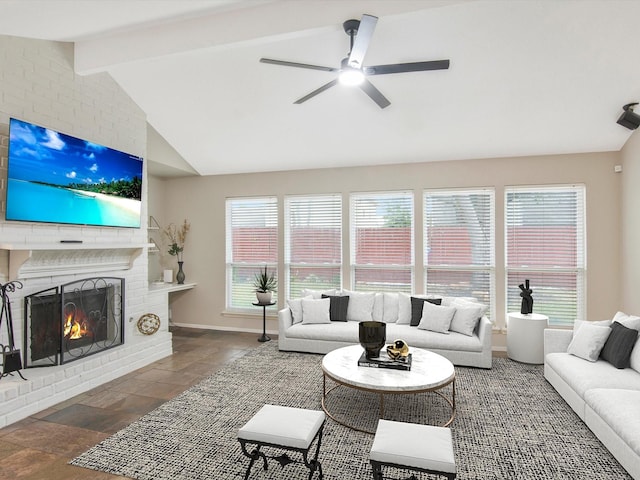 living room with vaulted ceiling with beams, a fireplace, and ceiling fan