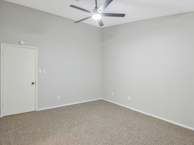 empty room with carpet floors and ceiling fan