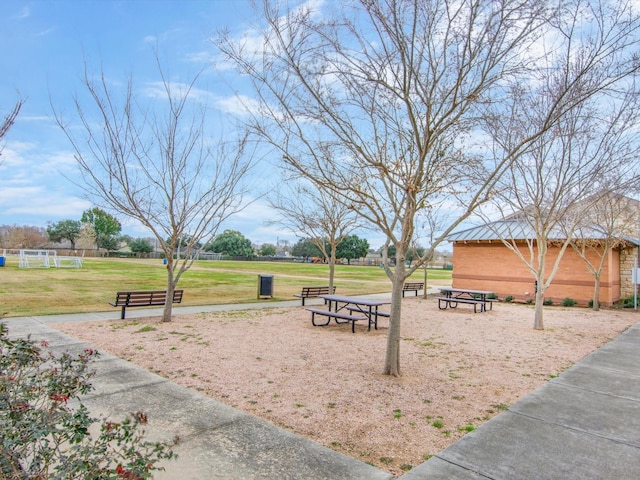 surrounding community featuring a yard