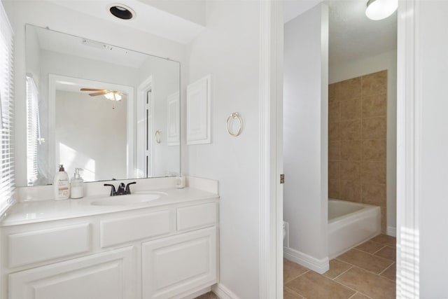 bathroom featuring ceiling fan, vanity, and tile patterned flooring