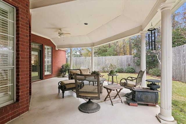 view of patio featuring ceiling fan