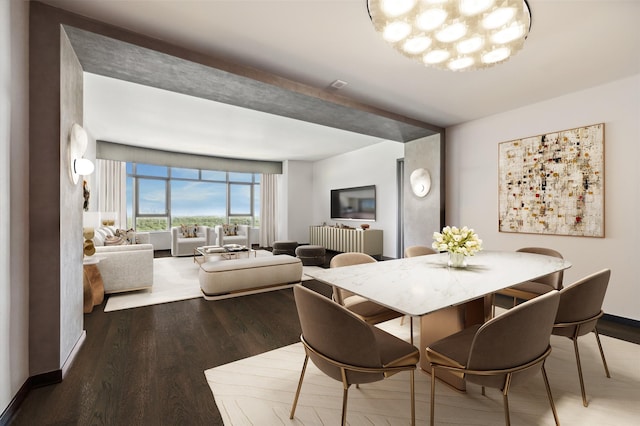 dining area featuring beam ceiling, hardwood / wood-style floors, and an inviting chandelier