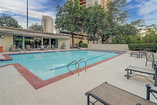 view of pool with a patio area