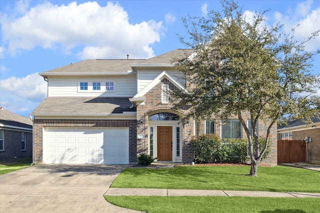 view of front of property with a garage and a front yard