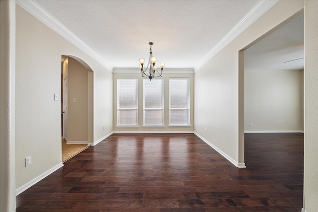 unfurnished dining area featuring ornamental molding, a chandelier, a textured ceiling, and dark hardwood / wood-style flooring