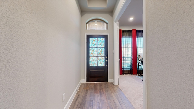 doorway to outside with hardwood / wood-style floors