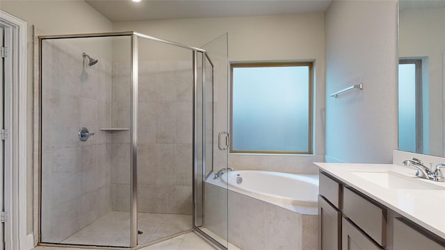 bathroom with tile patterned flooring, plus walk in shower, and vanity