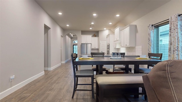 dining room featuring light hardwood / wood-style floors