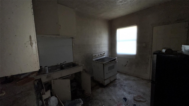 kitchen with white stove