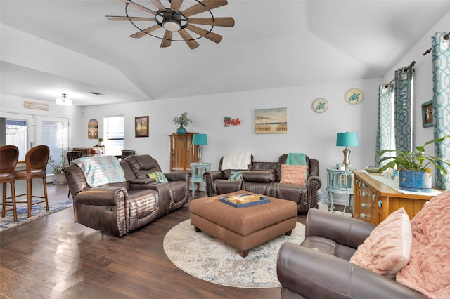 living room featuring vaulted ceiling, ceiling fan, and dark hardwood / wood-style flooring