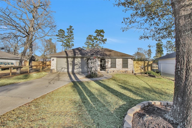 view of front facade featuring a garage and a front lawn