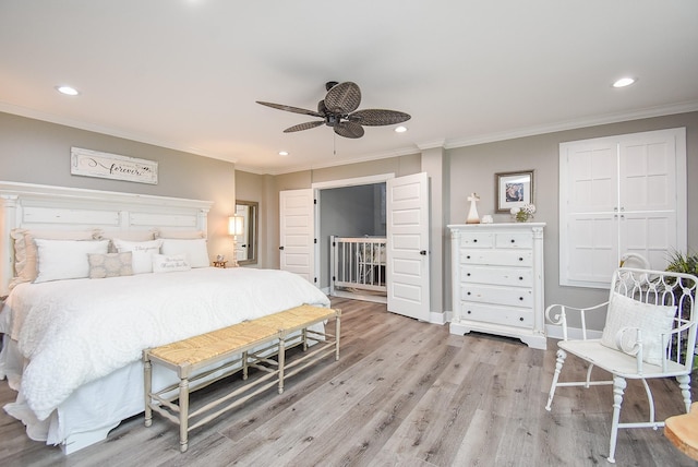 bedroom with crown molding, ceiling fan, and light wood-type flooring