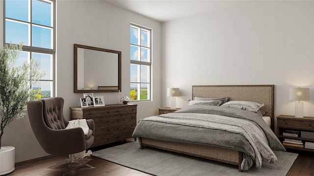 bedroom with dark wood-type flooring