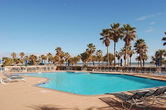 view of swimming pool featuring a patio area