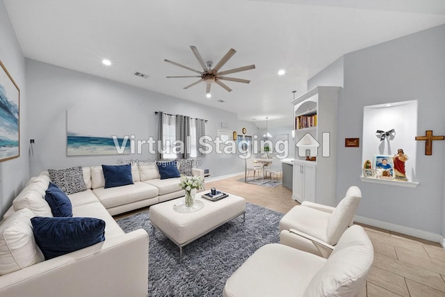 living room featuring ceiling fan