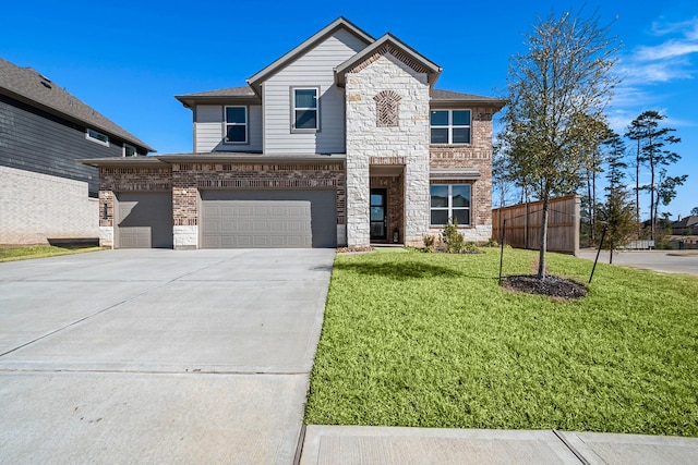 view of front facade with a garage and a front yard