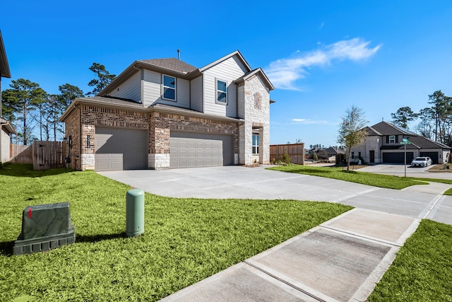 view of front of home with a garage and a front yard