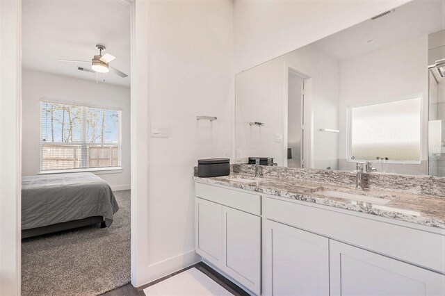 bathroom with vanity and ceiling fan