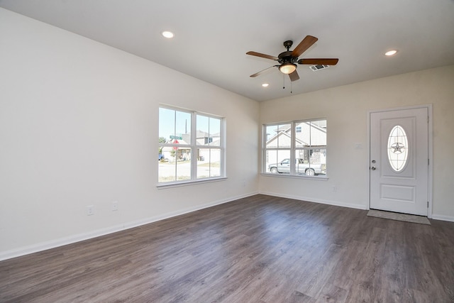 foyer featuring dark wood-type flooring and ceiling fan