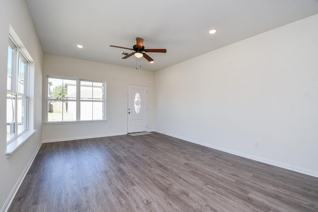 entryway featuring ceiling fan and dark hardwood / wood-style flooring