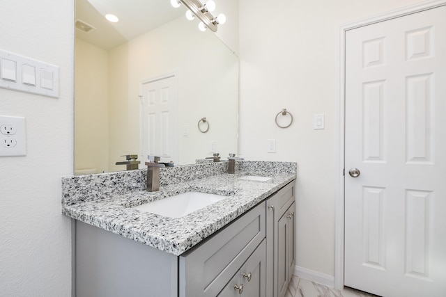 bathroom featuring vanity