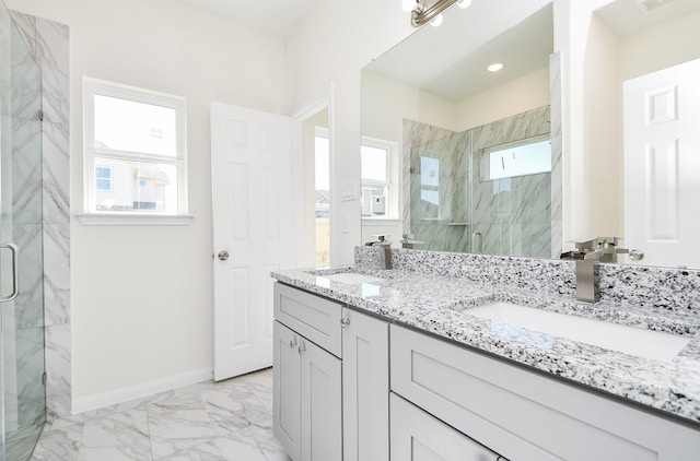 bathroom featuring vanity and walk in shower