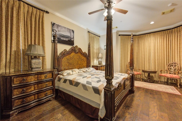 bedroom with crown molding, dark hardwood / wood-style floors, and ceiling fan