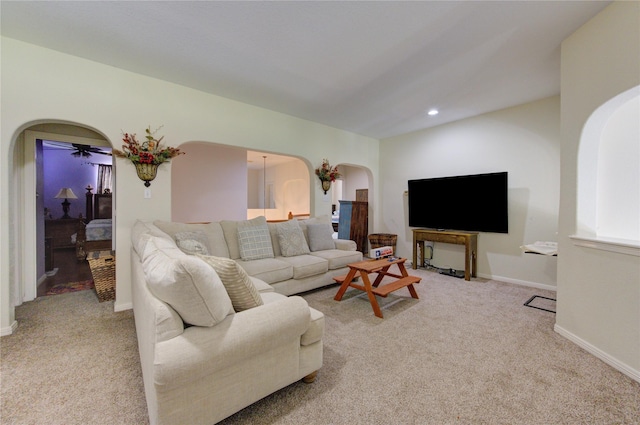 living room featuring light carpet