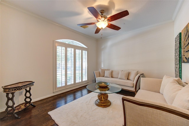 living room featuring ornamental molding, ceiling fan, and dark hardwood / wood-style flooring