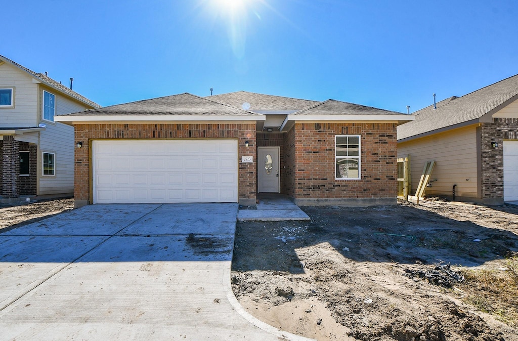 view of front of home with a garage