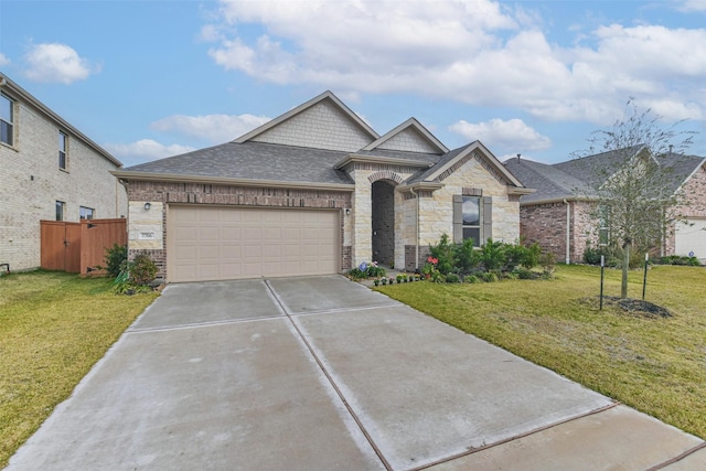 view of front facade featuring a garage and a front yard