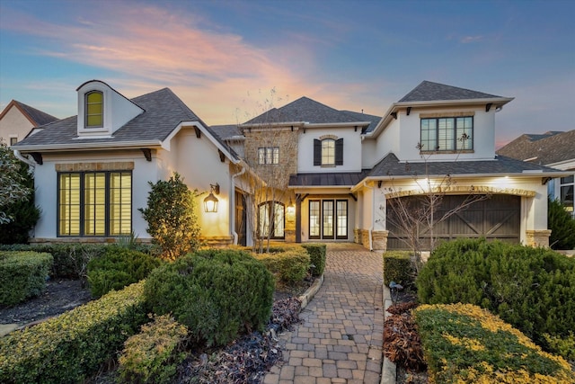 view of front of home with a garage